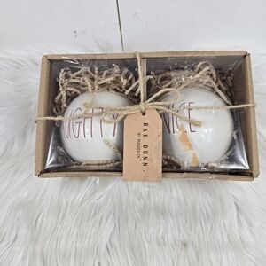 Rae Dunn White Ceramic Naughty/Nice Ornaments.